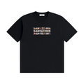 A black short-sleeve crewneck t-shirt featuring the word 'DANGEROUS' printed three times in a horizontal row on the chest, with each letter filled with a multicolor photographic pattern. The shirt is displayed flat against a solid white background.