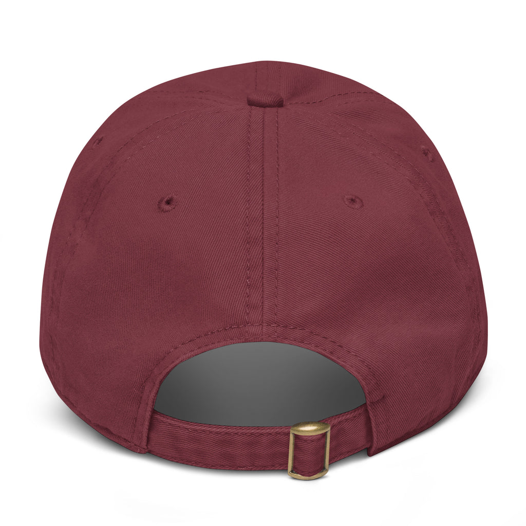 Maroon baseball cap with a gold buckle on a white background