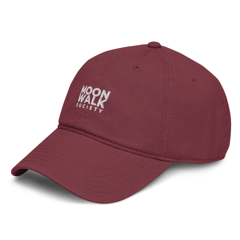 Maroon cap with a logo on a white background