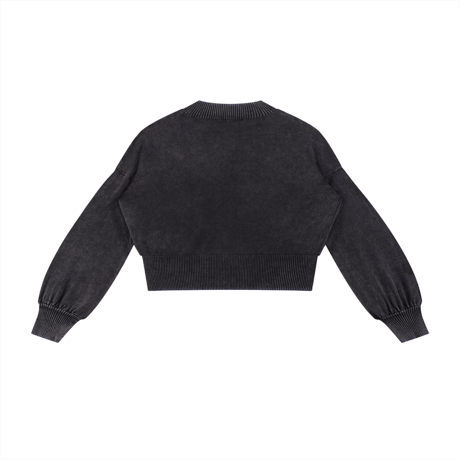 Black sweater with balloon sleeves on a white background