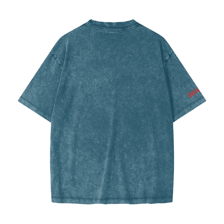 Blue t-shirt with a red logo on the sleeve against a white background