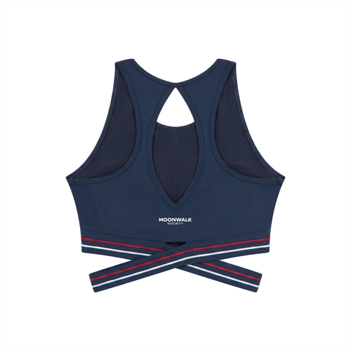 Navy blue sports bra with red and white accents on a white background