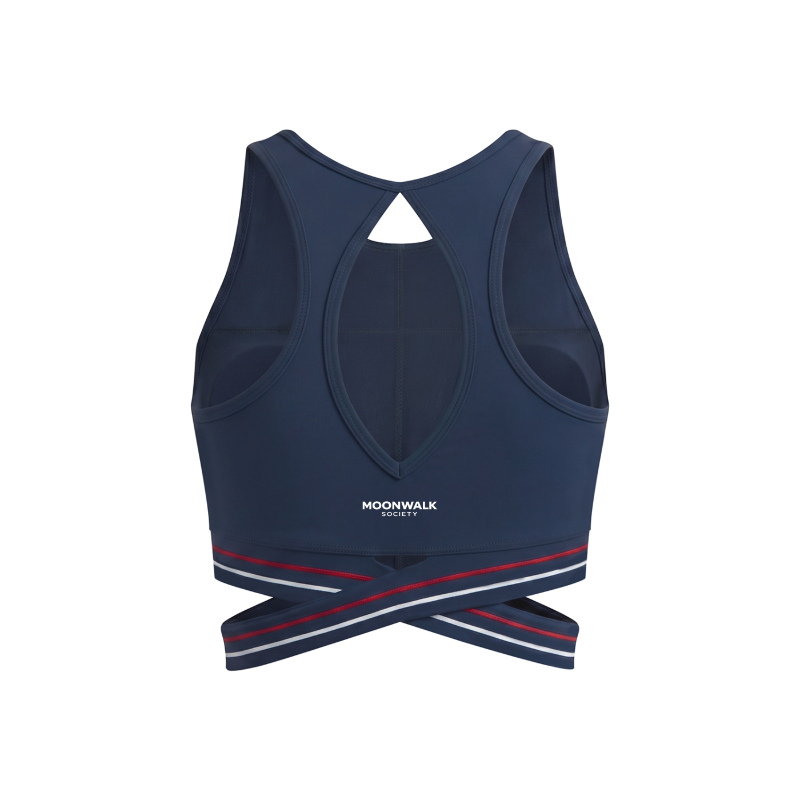 Navy blue sports bra with red and white accents on a white background