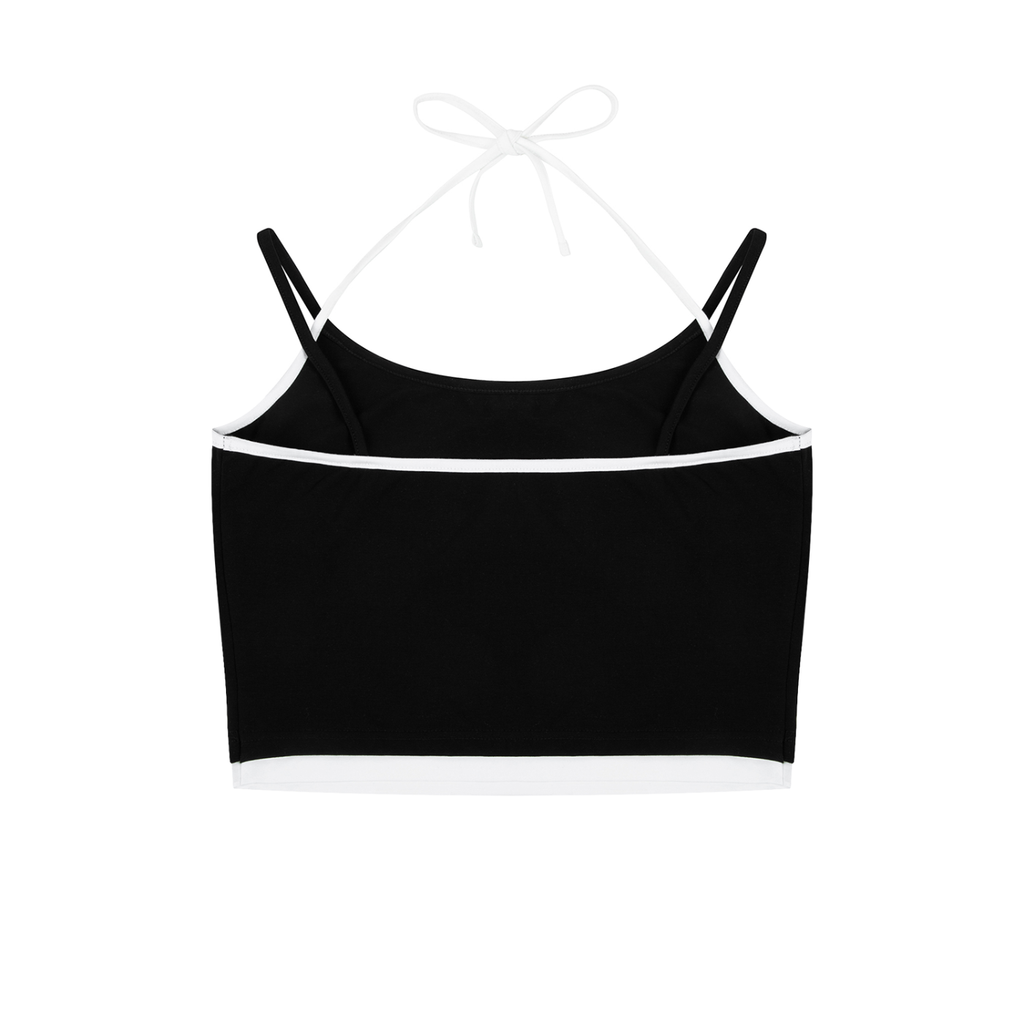 Black crop top with thin straps on a white background