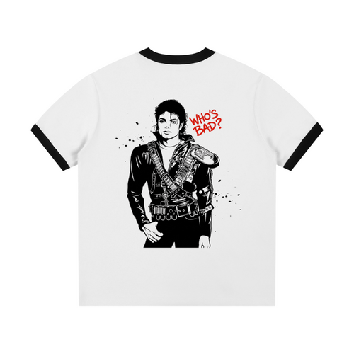 White t-shirt with black ringer sleeves featuring a graphic of a person in a leather outfit and 'WHO'S BAD?' text.